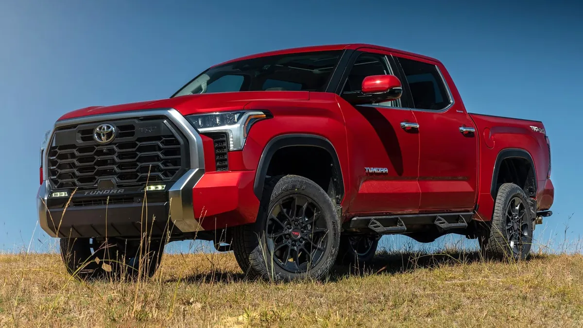 Red Toyota Tundra pickup truck ready for shipment